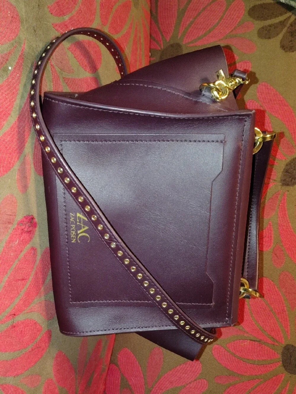 Designer Iconic Grommetted Crossbody Leather Top-Handle Satchel in Deep Plum